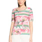 Woman wearing a floral print top on a white background