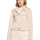 Woman wearing a beige jacket on a white background