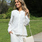 Lace blouse with decorative hem
