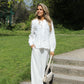 Lace blouse with decorative hem