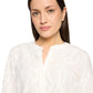 Lace blouse with decorative hem