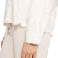 Lace blouse with decorative hem