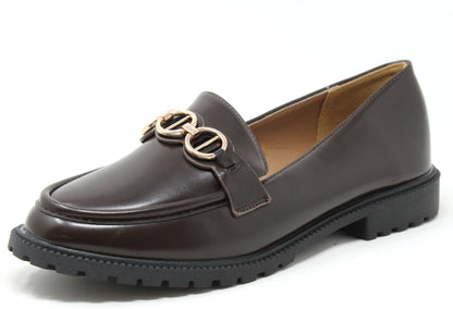 Brown loafer shoe with gold buckle on a white background