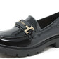 Black patent leather loafer with gold buckle on a white background