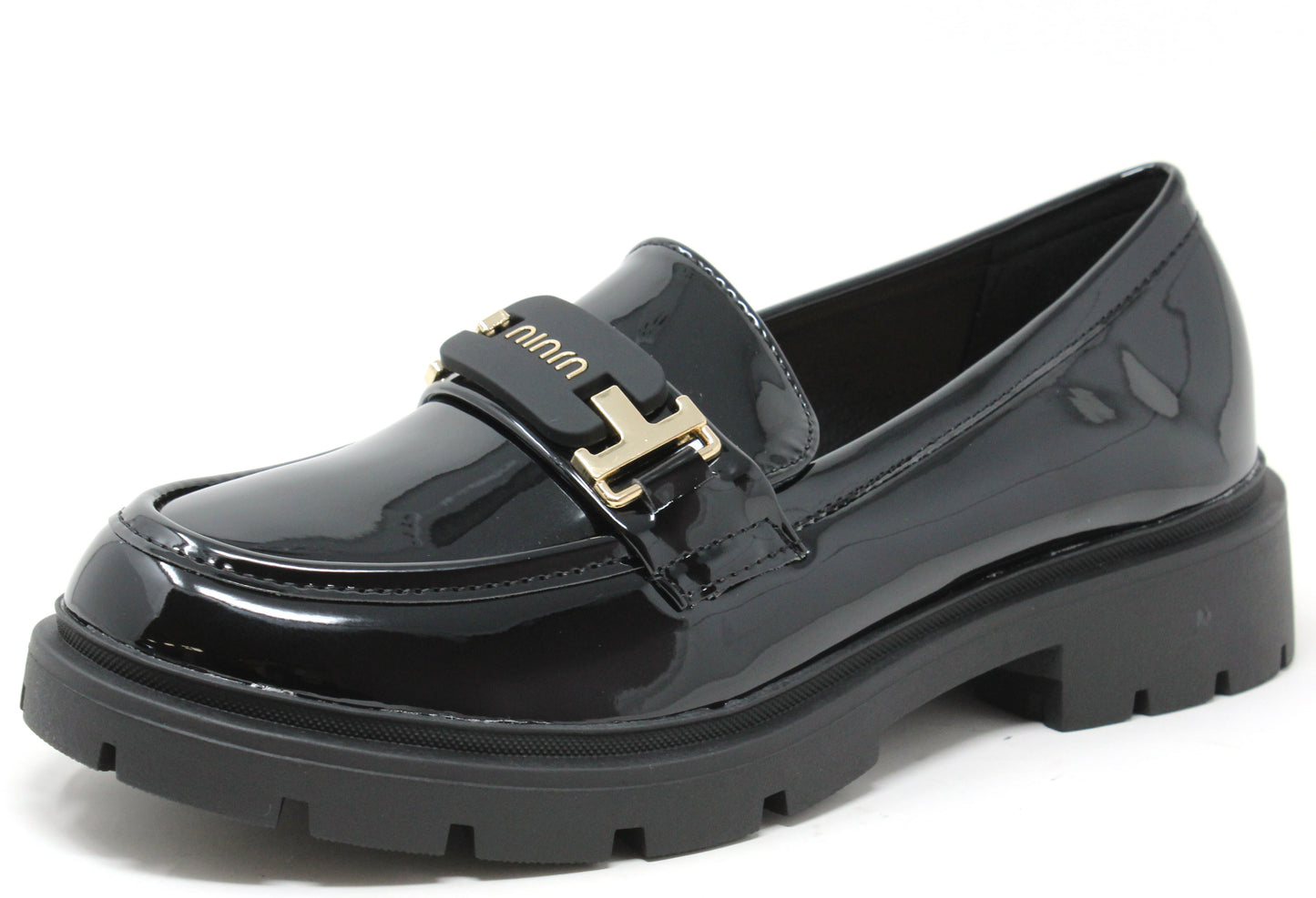 Black patent leather loafer with gold buckle on a white background