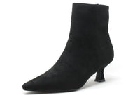 Black ankle boot on a white background