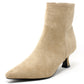 Beige ankle boot on a white background