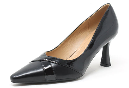 Black patent leather high heel shoe on a white background