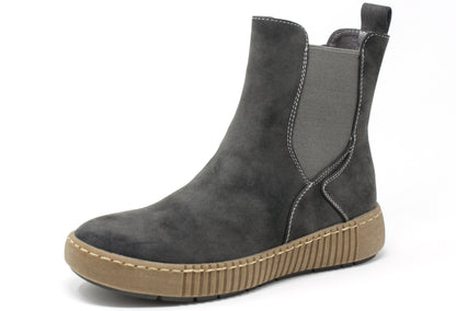 Gray ankle boot with a brown sole on a white background