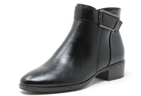 Black leather ankle boot with a buckle on a white background