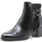 Black leather ankle boot with a buckle on a white background
