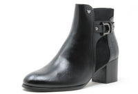Black leather ankle boot with a buckle on a white background