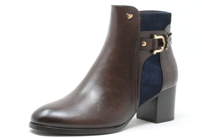 Brown ankle boot with gold buckle on a white background