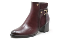 Burgundy ankle boot with gold buckle on a white background
