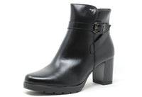 Black leather ankle boot with a buckle on a white background