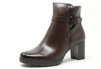 Brown leather ankle boot with a buckle on a white background