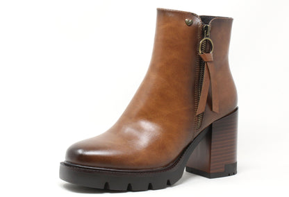 Brown leather ankle boot with a block heel on a white background