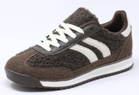 Brown sneaker with white stripes on a white background