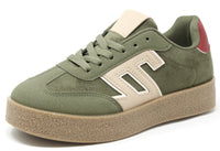 Green sneaker with beige accents on a white background