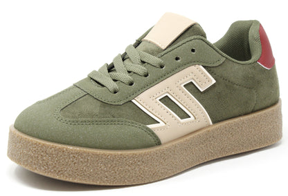 Green sneaker with beige accents on a white background