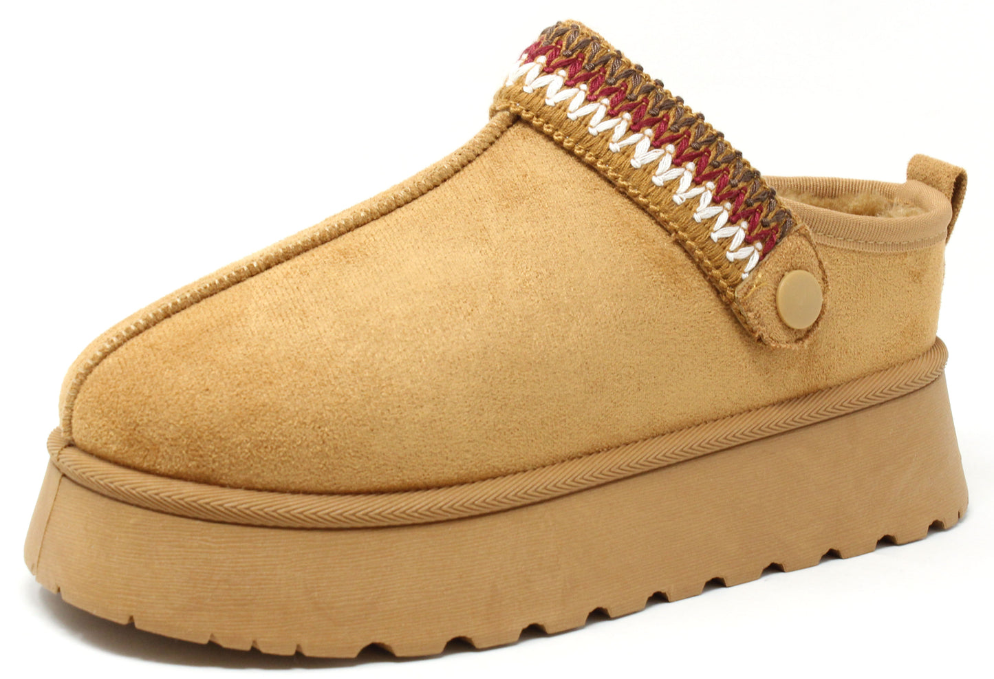 Tan slip-on shoe with a textured strap on a white background