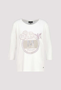 Top with decorative emblem