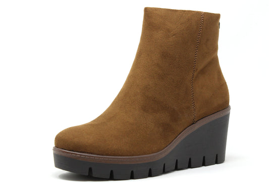 Black wedge ankle boot on a white background