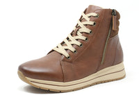 Brown leather boot with beige laces and sole on a white background