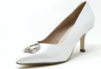 White high-heeled shoe with a decorative buckle on a white background