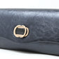 Blue clutch bag with a gold clasp on a white background