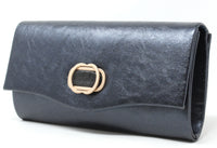 Blue clutch bag with a gold clasp on a white background