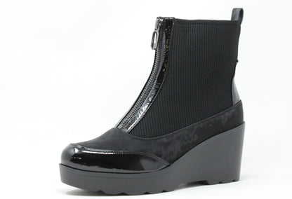 Black wedge ankle boot with a platform sole on a white background