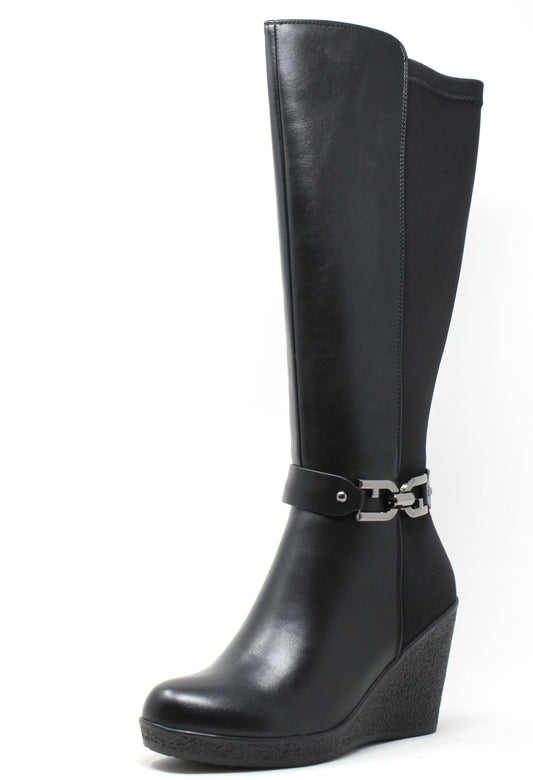 Black wedge boot with a silver buckle on a white background