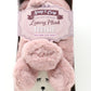 Pink plush footie with a dog face design in packaging, featuring the brand 'Snug & Cosy'.