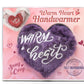 Purple heart-shaped handwarmer with 'Warm Heart' text on a pink packaging background