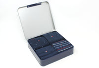 Set of men's dress socks in a branded box on a white background