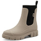 Beige rubber boot with a black inner lining on a white background