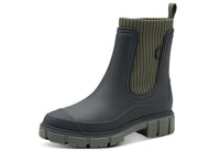 Green rubber boot with a white background