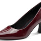 Maroon high-heeled shoe on a white background