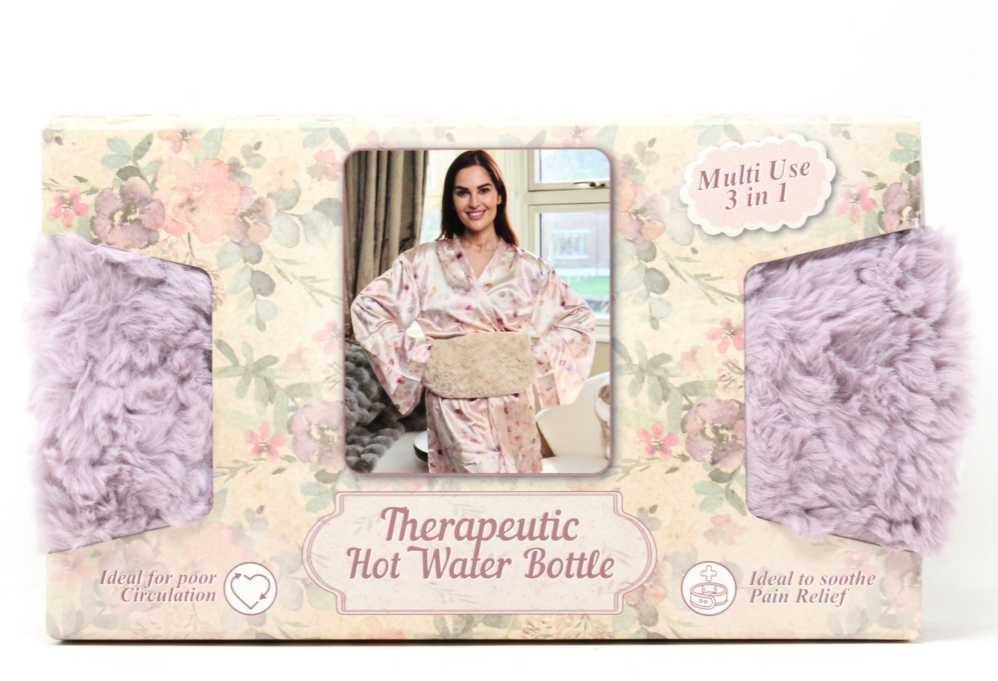 Packaging of a therapeutic hot water bottle with floral design and woman in robe photo.