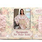 Packaging of a therapeutic hot water bottle with floral design and woman in robe photo.