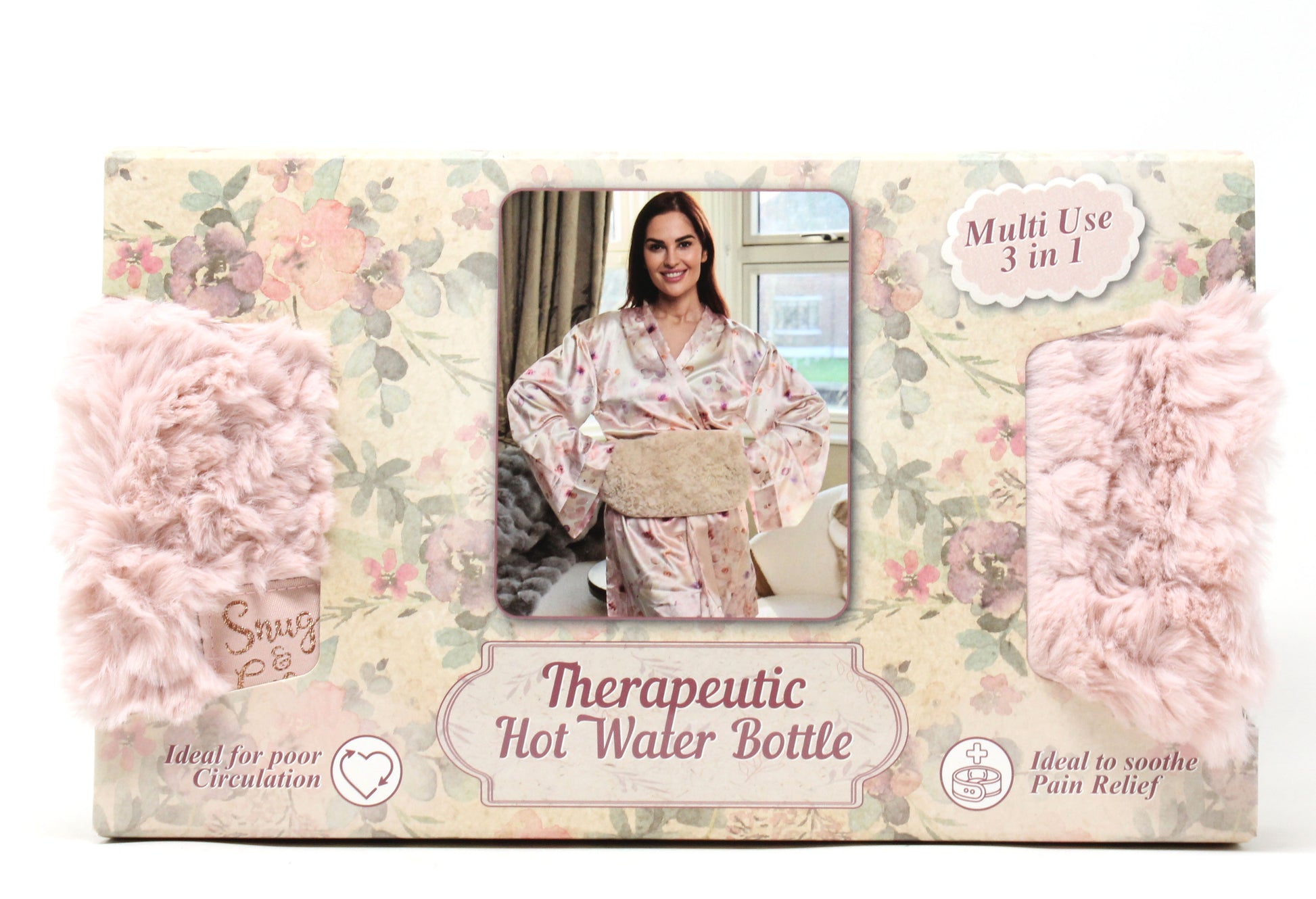 Packaging of a therapeutic hot water bottle with floral design and woman in robe photo.