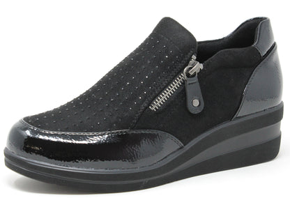 Black slip-on shoe with a zipper on a white background
