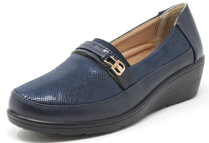 Navy blue loafer shoe with a gold buckle on a white background