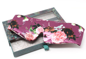 Floral-patterned product in a decorative box on a white background