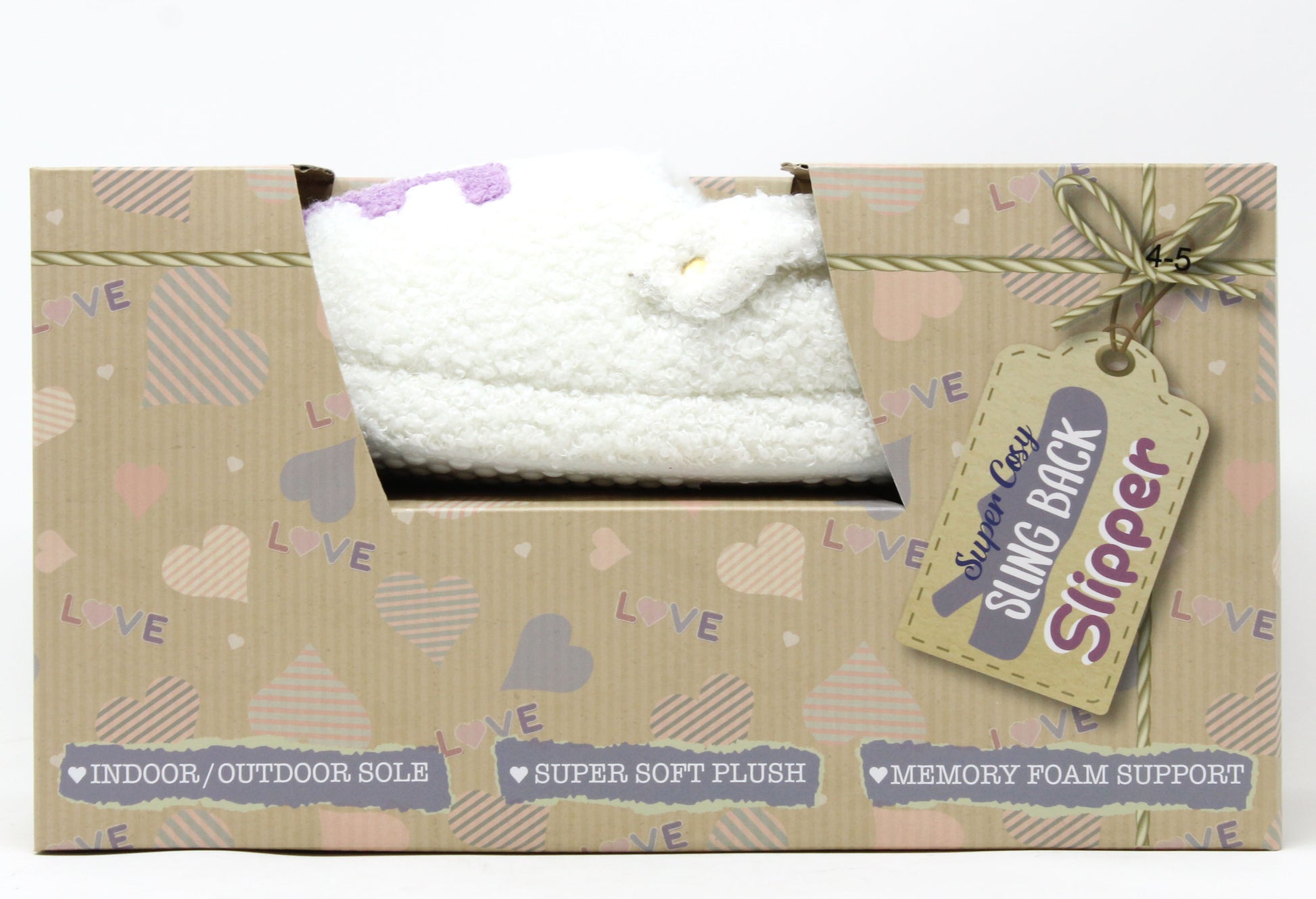 White slippers in a box with decorative packaging and a tag.