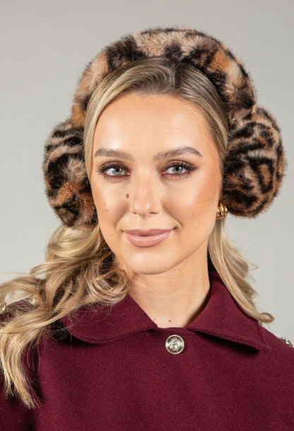 woman wearing leopard printed faux fur earmuffs