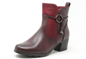 Burgandy ankle boot with ring detail on a white background