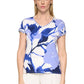 Woman wearing a blue floral patterned shirt on a white background