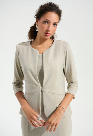 Woman wearing a beige suit on a white background